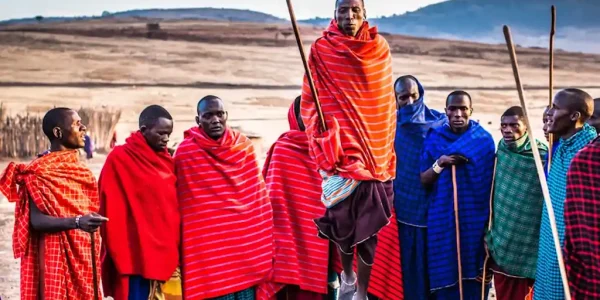 Maasai men jumping in a traditional dance, a symbol of strength and unity in their culture